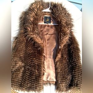 Faux fur collared vest, fully lined. Brown w/black stripes. Large. 2 pockets.